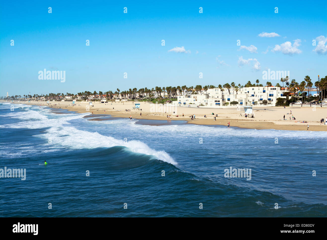 A panorama of the shoreline and sandy beach at historic Huntington Beach, California. Stock Photo