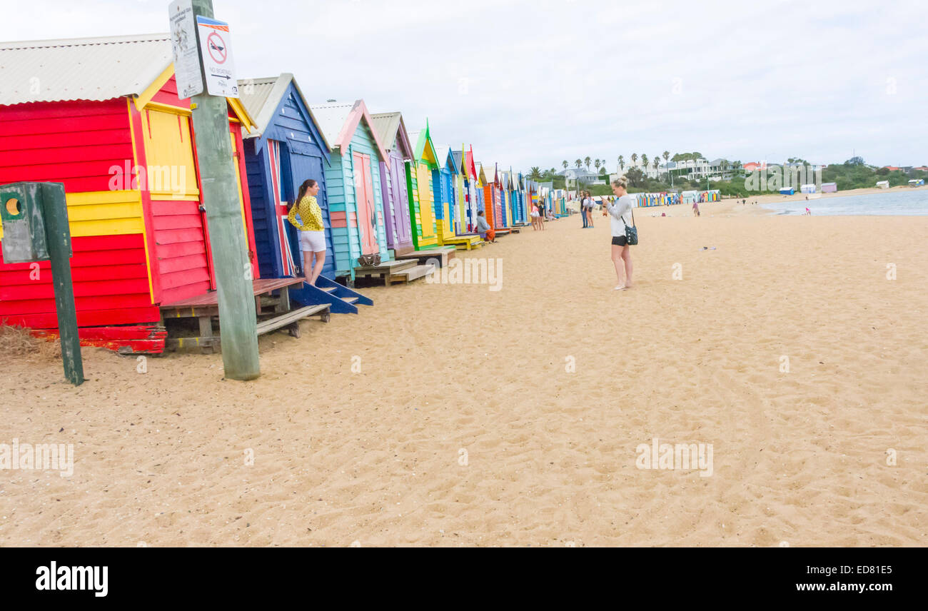 Beach huts on Brighton beach summer Stock Photo