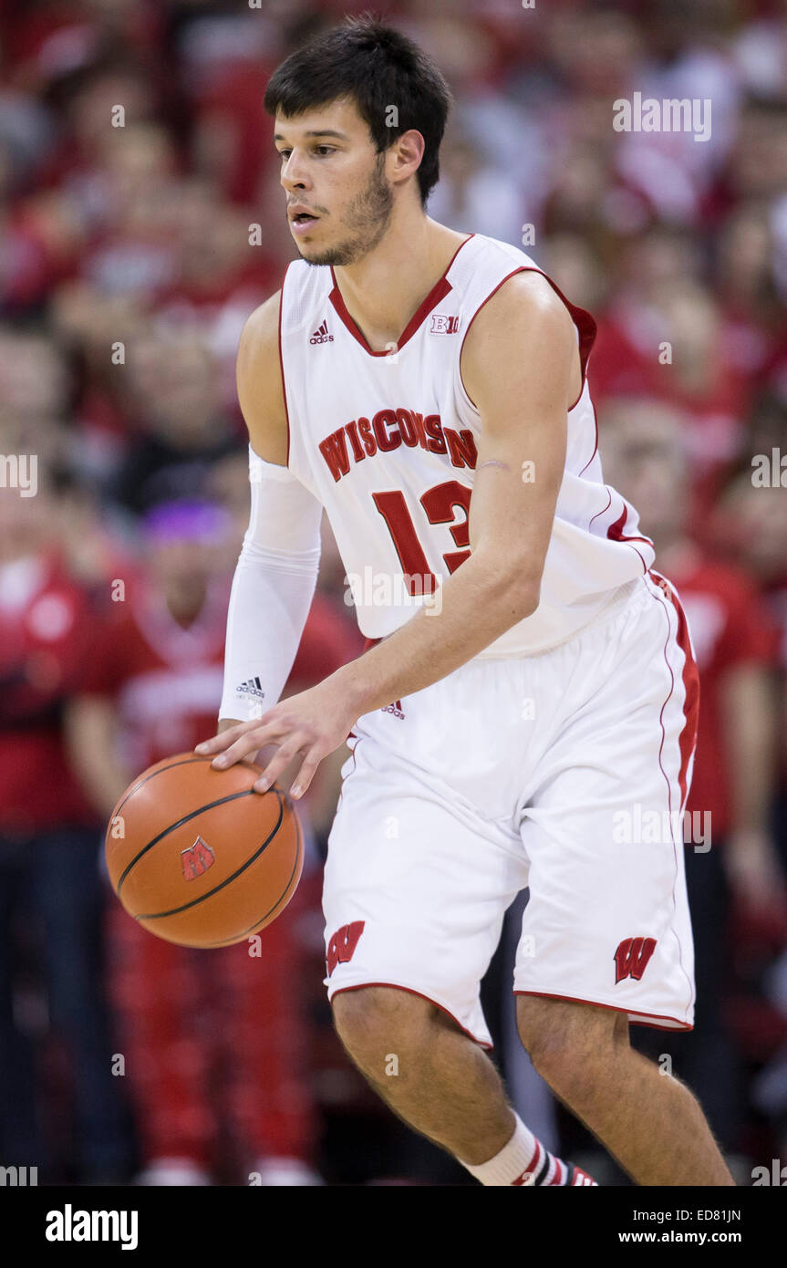 December 31, 2014: Wisconsin Badgers forward Duje Dukan #13 dribbles the ball during the NCAA Basketball game between the Wisconsin Badgers and Penn State Nittany Lions at the Kohl Center in Madison, WI. Wisconsin defeated Penn State 89-72. John Fisher/CSM Stock Photo