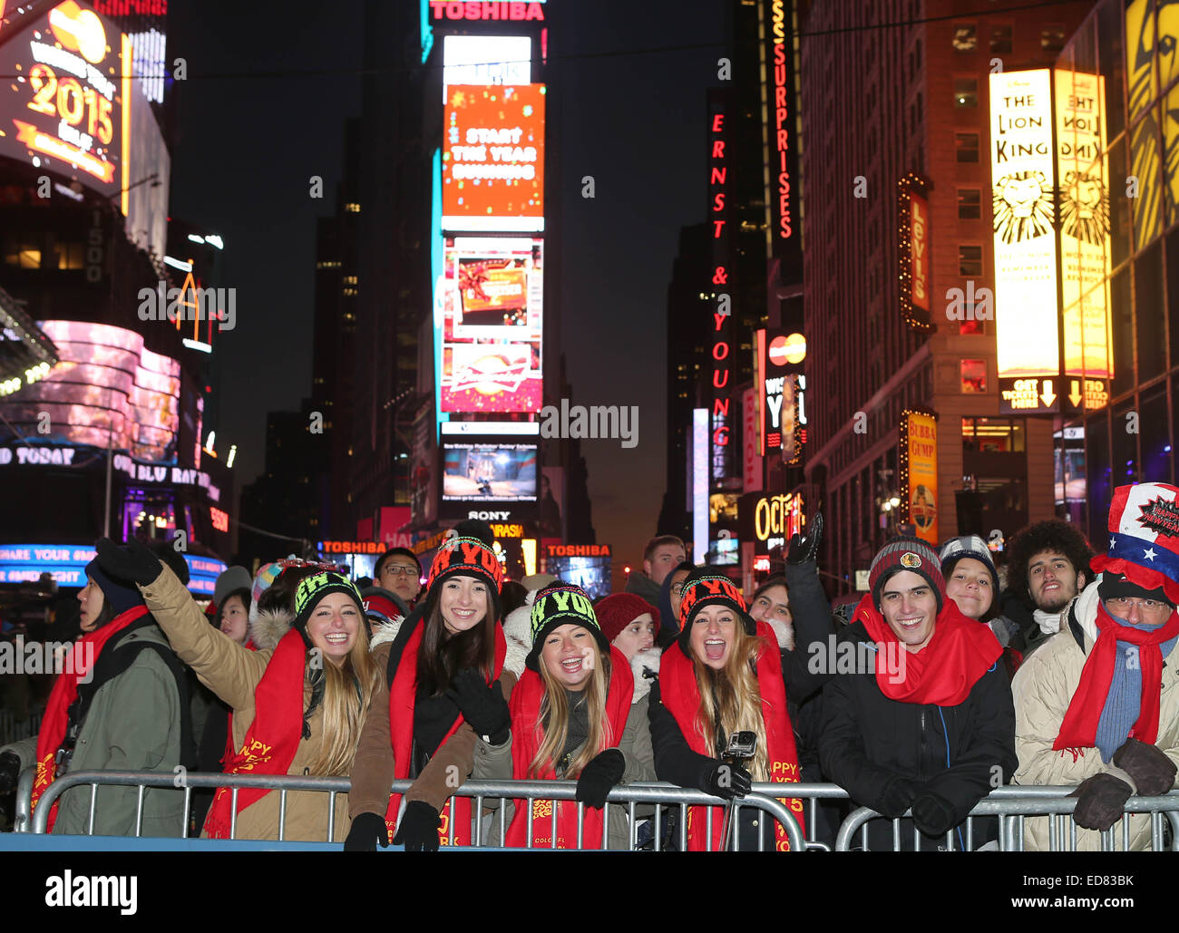 New York, USA. 31st Dec, 2014. People participate in the New Year's Eve celebration at Times Square in New York, the United States on Dec. 31, 2014. Times Square has been the center of worldwide attention on New Year's Eve for more than 100 years. The first Ball Lowering celebration occurred in 1907, and this tradition is now a universal symbol of welcoming the New Year. Credit:  Qin Lang/Xinhua/Alamy Live News Stock Photo