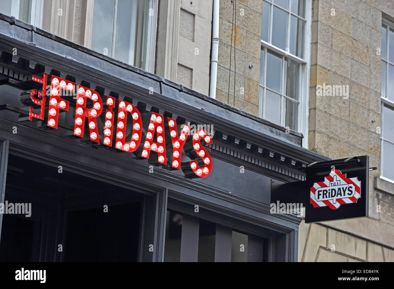 Signs over T G I Fridays restaurant, Edinburgh Stock Photo