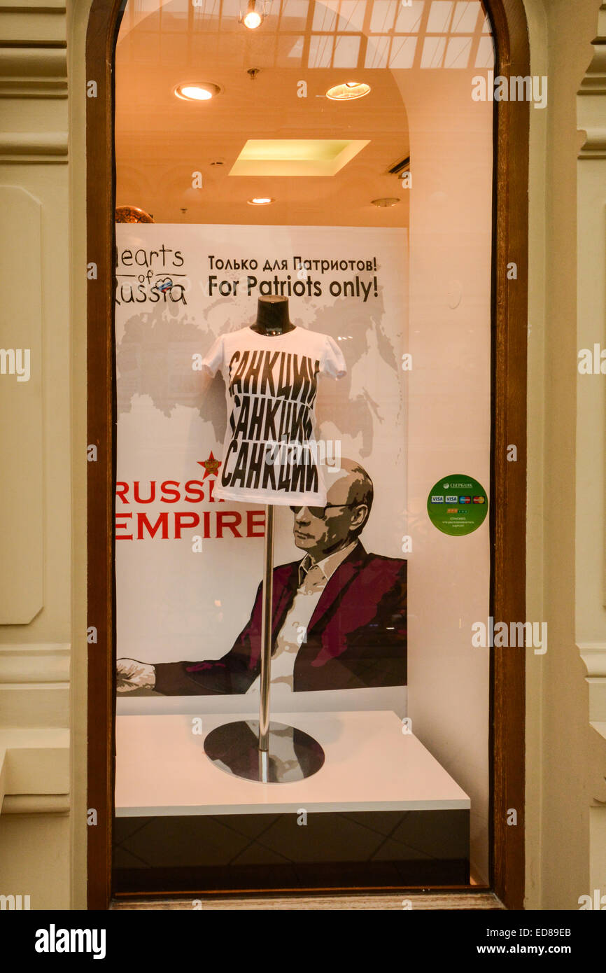 Russian sanctions - 'sanctions sanctions sanctions' t shirt for sale in 2014 in gift shop window in GUM Department Store, Moscow, Russia Stock Photo