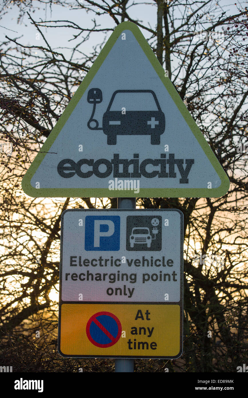 An electric car recharging station at a service station on the M6 motorway, Lancashire, UK. Stock Photo