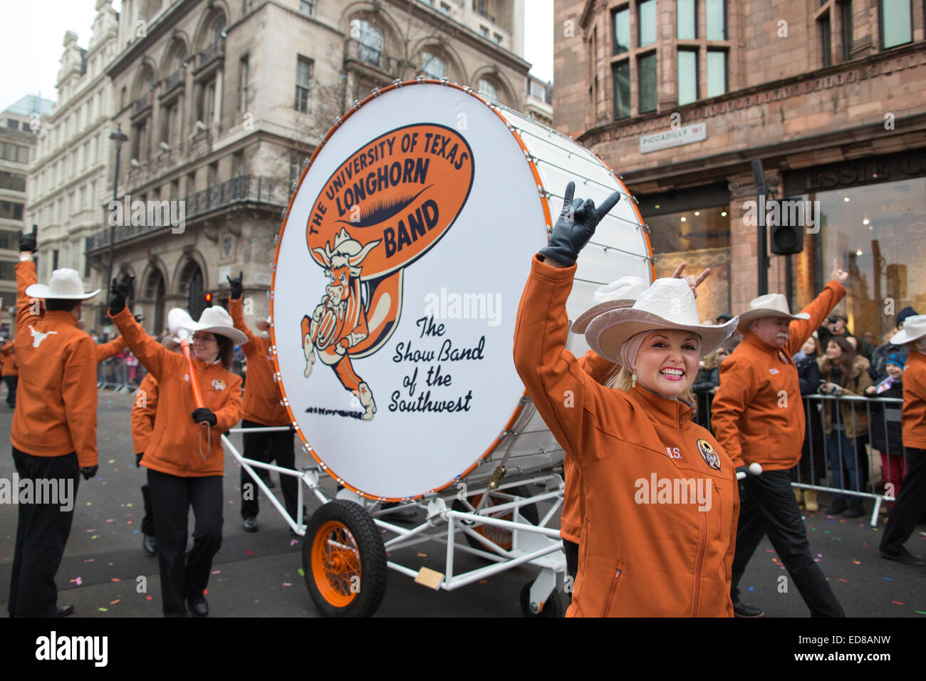 London, UK. 1st January, 2015. London's New Year's Day Parade 2015, London, England, UK Performers from The Longhorn Alumni Band from Texas USA take part in the London's New Year's Parade 2015 with it's transport theme of 'London on the Move' featuring marching bands, dancers and a myriad of vehicles of all shapes abd sizes. Credit:  Jeff Gilbert/Alamy Live News Stock Photo