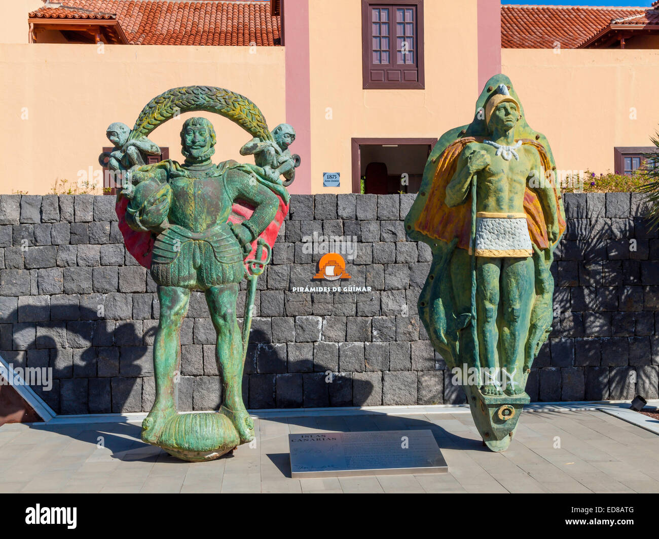 Statues representing the Spanish conquerors and the conquered stone age Guanaches at the Piramides de Guimar Ethnographic Park Stock Photo