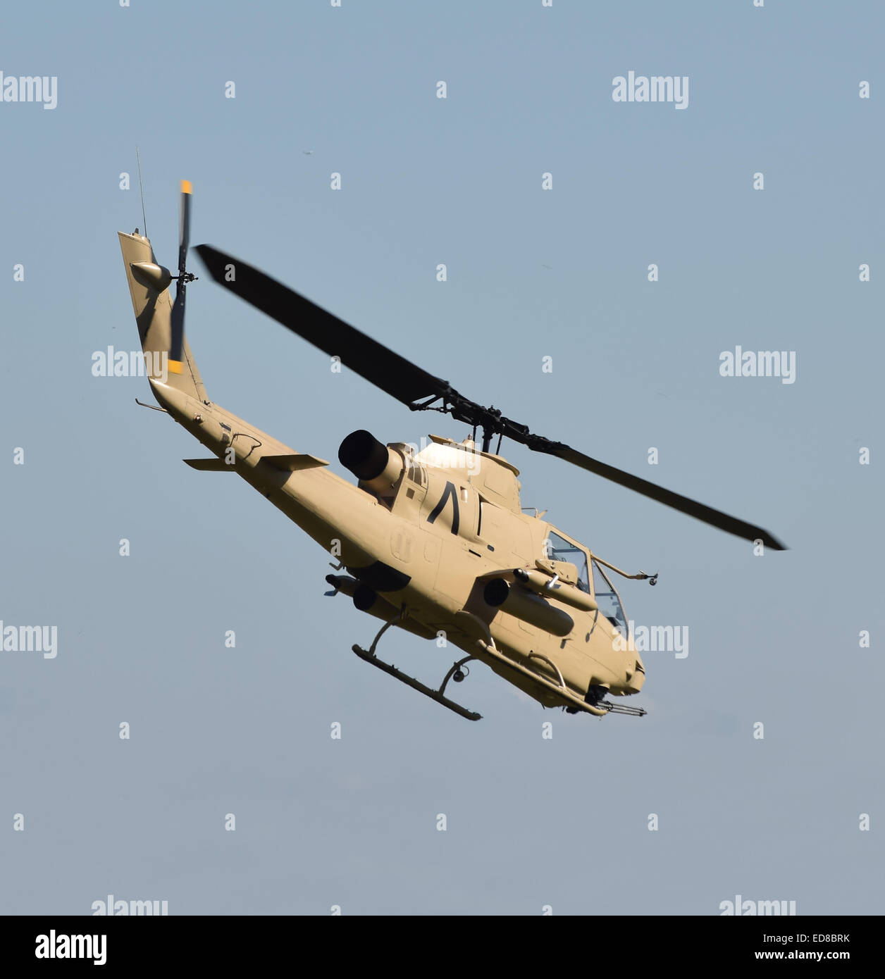 Vietnam War era military helicopter departing on a mission Bell AH-1 Cobra Stock Photo