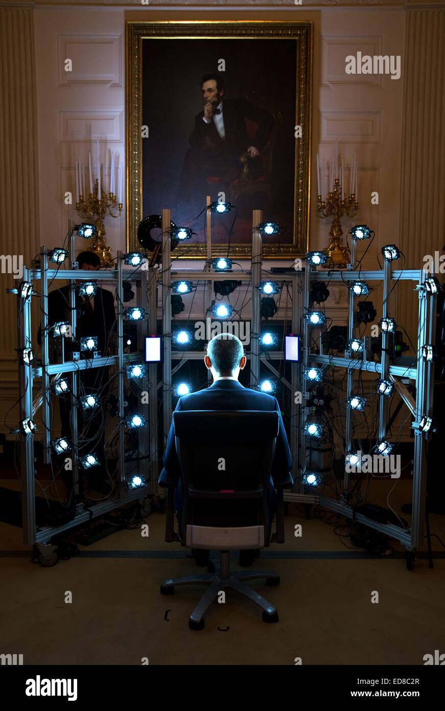 US President Barack Obama sits for a 3D portrait being produced by the Smithsonian Institution the White House June 9, 2014 in Washington, DC. Stock Photo