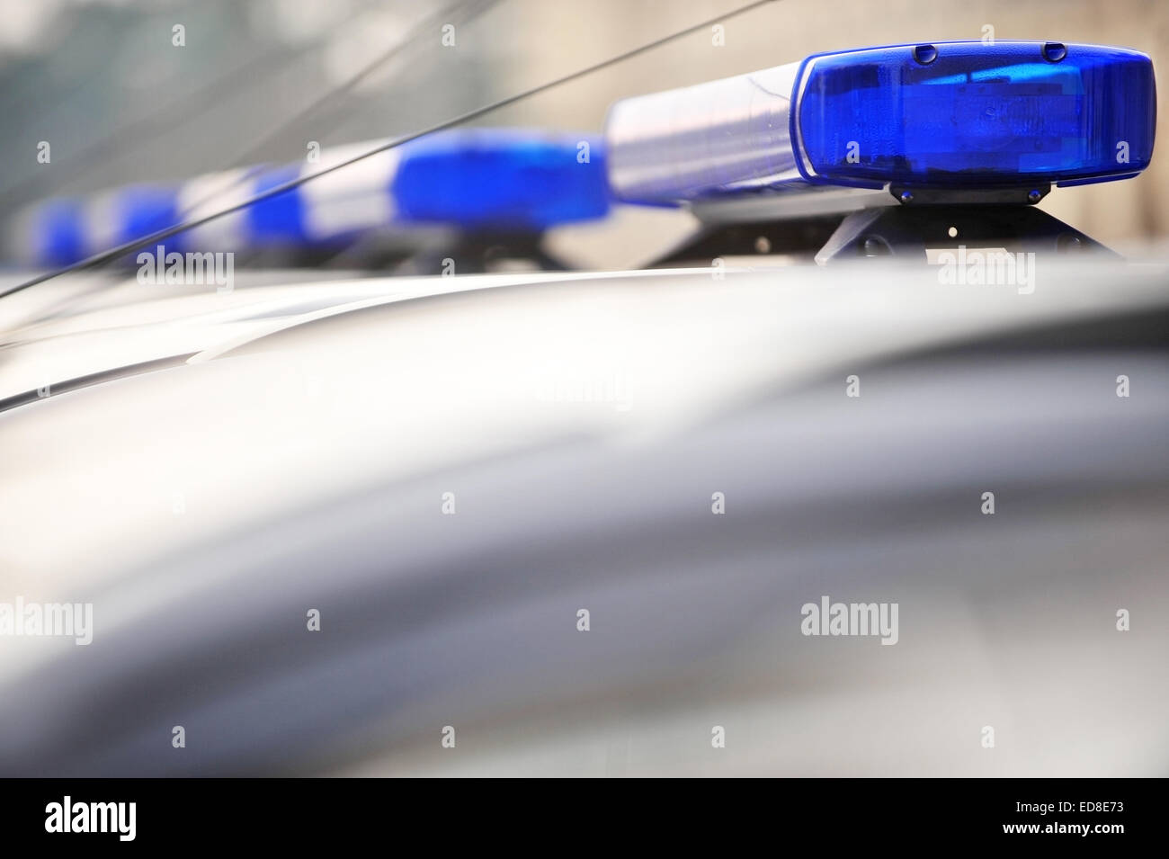 Detail with police blue siren lights on a car Stock Photo