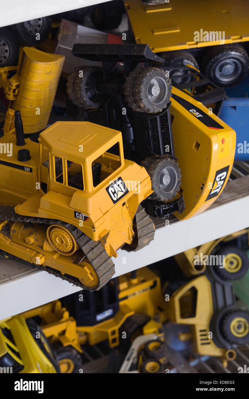 Trucks and diggers for use in the garden. Children's toys. Stock Photo