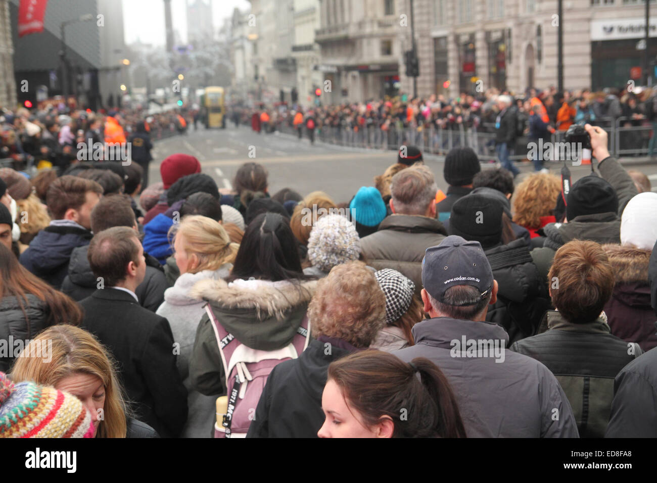 London, UK. 1 January 2015. Londoners and tourists turned up in droves for the new years parade. The annual parade goes through Piccadilly, Regents street, Pall Mall and Whitehall a 2 mile route. Photo: David Mbiyu/ Alamy Live News Stock Photo