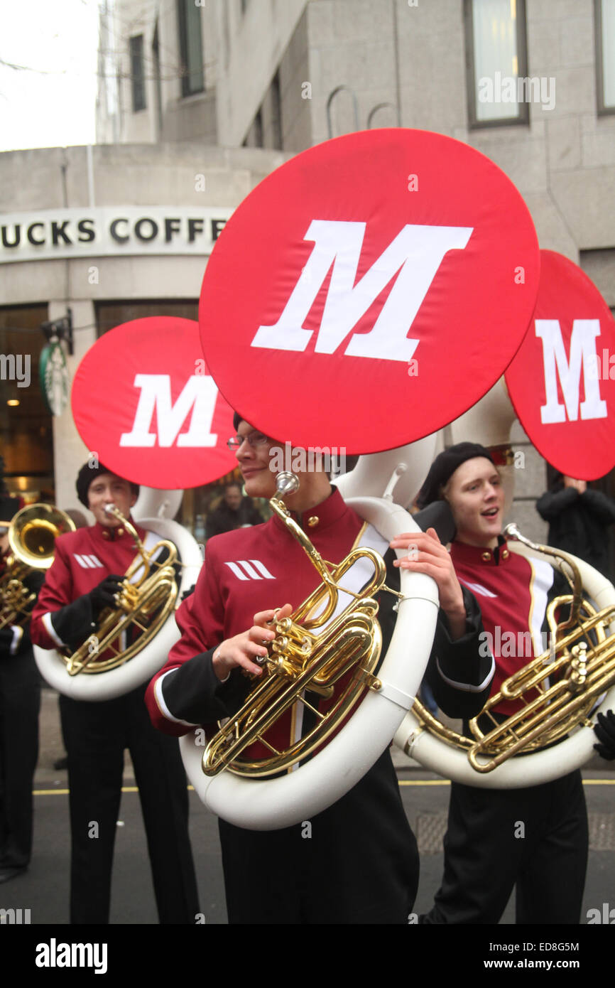 London, UK. 1 January 2015. Band members do a final rehearsal ahead of the parade start at noon. Londoners and tourists turned up in droves for the new years parade. The annual parade goes through Piccadilly, Regents street, Pall Mall and Whitehall a 2 mile route. Photo: David Mbiyu/ Alamy Live News Stock Photo