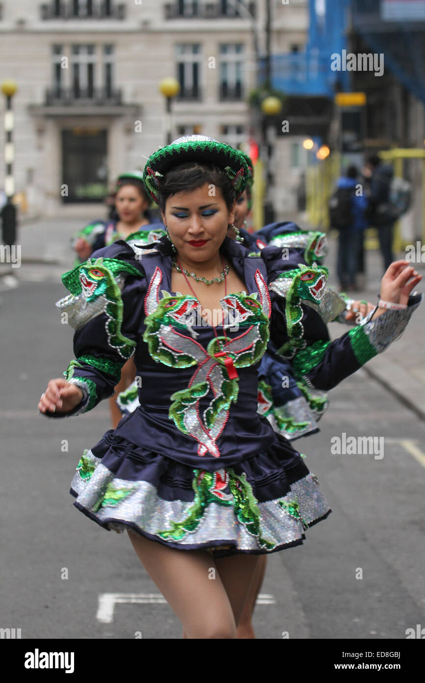 London, UK. 1 January 2015. A  Caporales San Simon Londres dancer from Bolivia seen at rehearsals ahead of the new years parade, Londoners and tourists turned up in droves for the new years parade. The annual parade goes through Piccadilly, Regents street, Pall Mall and Whitehall a 2 mile route. Photo: David Mbiyu/ Alamy Live News Stock Photo