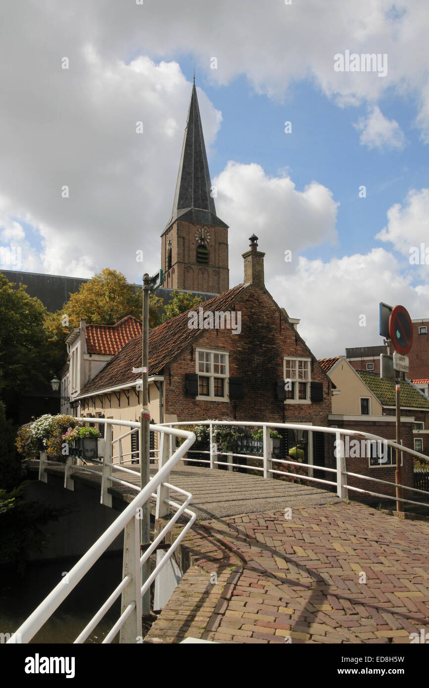 Kerkstraat bridge over the canal towards the Oude Kerk at Kerkplein, Maasland, Stock Photo