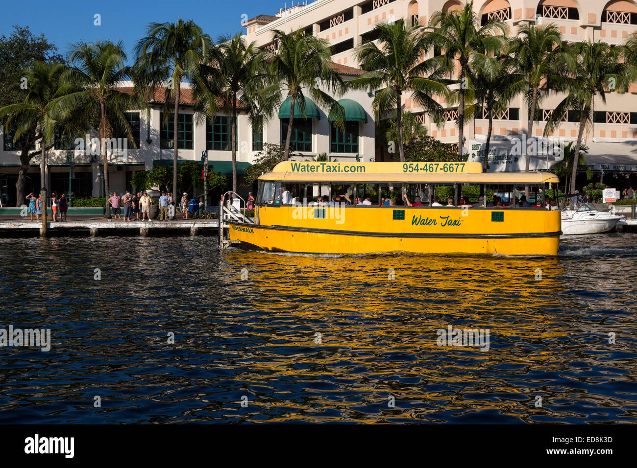 Ft. Lauderdale, Florida.  Water Taxi Approaching to Pick Up New Passengers. Stock Photo