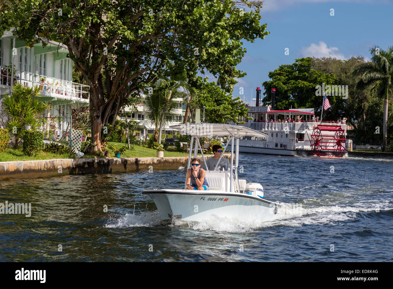 Ft. Lauderdale, Florida.  Pleasure Boating on New River.  Carrie B Sightseeing Paddle-wheel in the background. Stock Photo