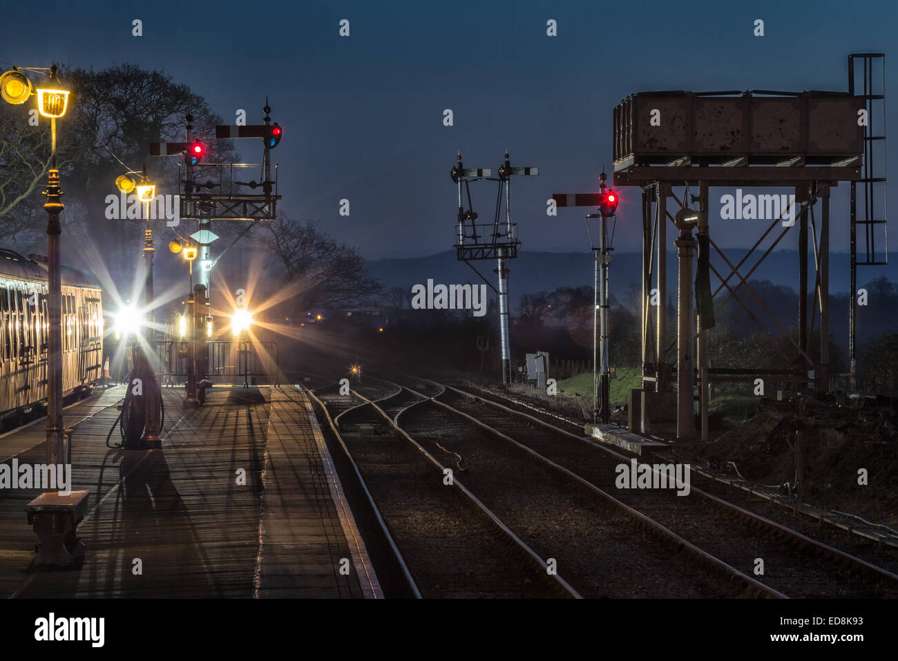 Bishops Lydeard station on the West Somerset Railway as dusk falls at the end of the Winter Steam Gala. Stock Photo