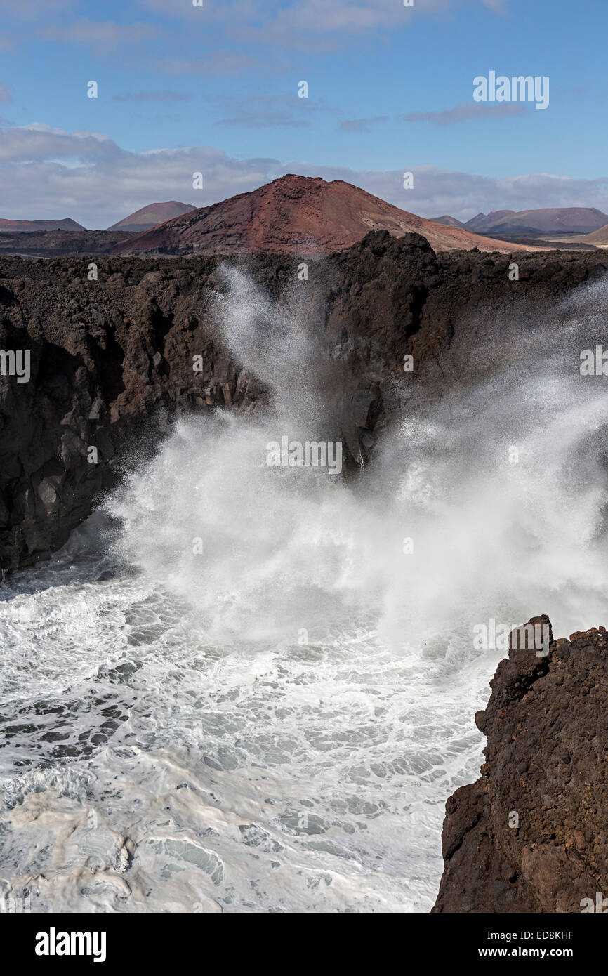 Rough seas on the exposed volcanic west coast at Los Hervideros, Lanzarote, Canary Islands, Spain Stock Photo