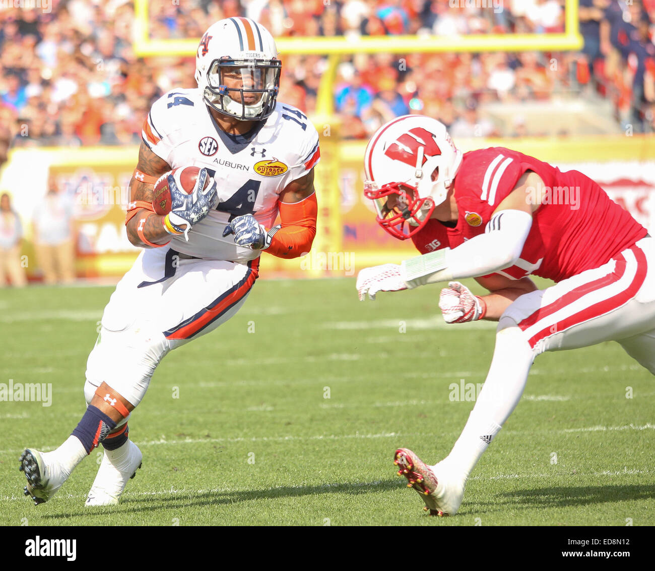 Tampa, FL, USA. 1st Jan, 2015. Auburn's Nick Marshall 14 braces to be