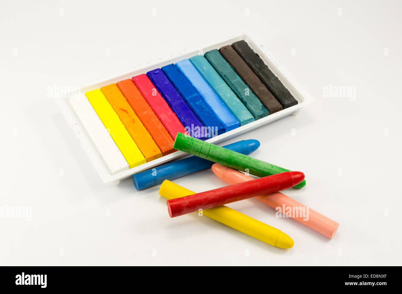 https://c8.alamy.com/comp/ED8NXF/materials-for-drawing-chalk-and-colored-crayons-ED8NXF.jpg
