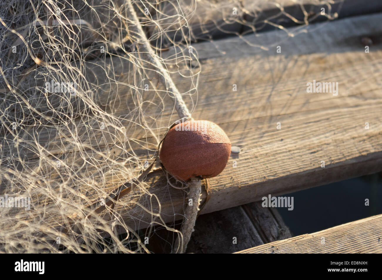 Fishing equipment on a old wooden table. Sport and recreation concept.  Selective focus. Macro Stock Photo - Alamy