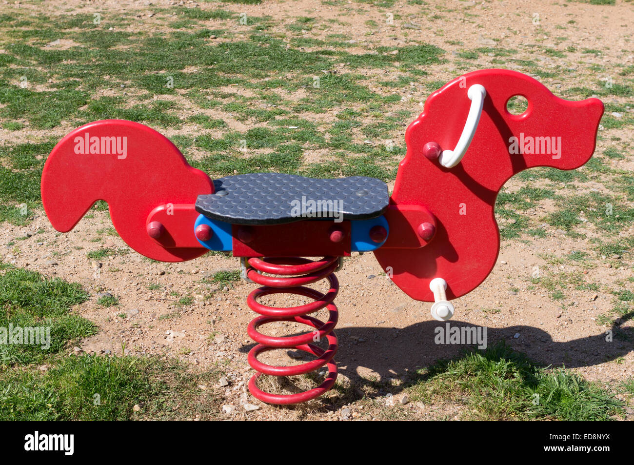 Detail of a playground: rocking horse for children. Stock Photo