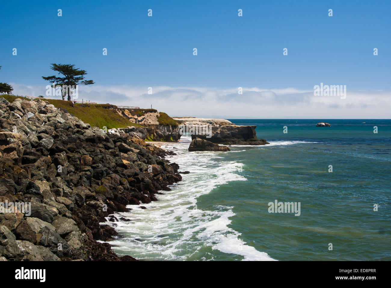 Arch in rock along California coast Stock Photo - Alamy