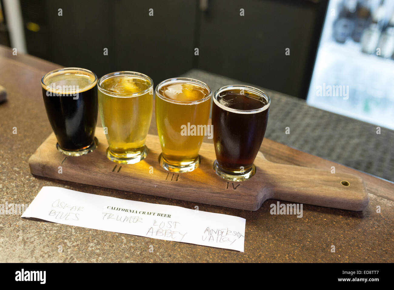 Flight of craft beers at a micro brewery. Stock Photo