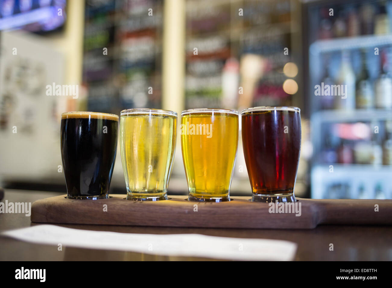 Flight of craft beers at a micro brewery. Stock Photo