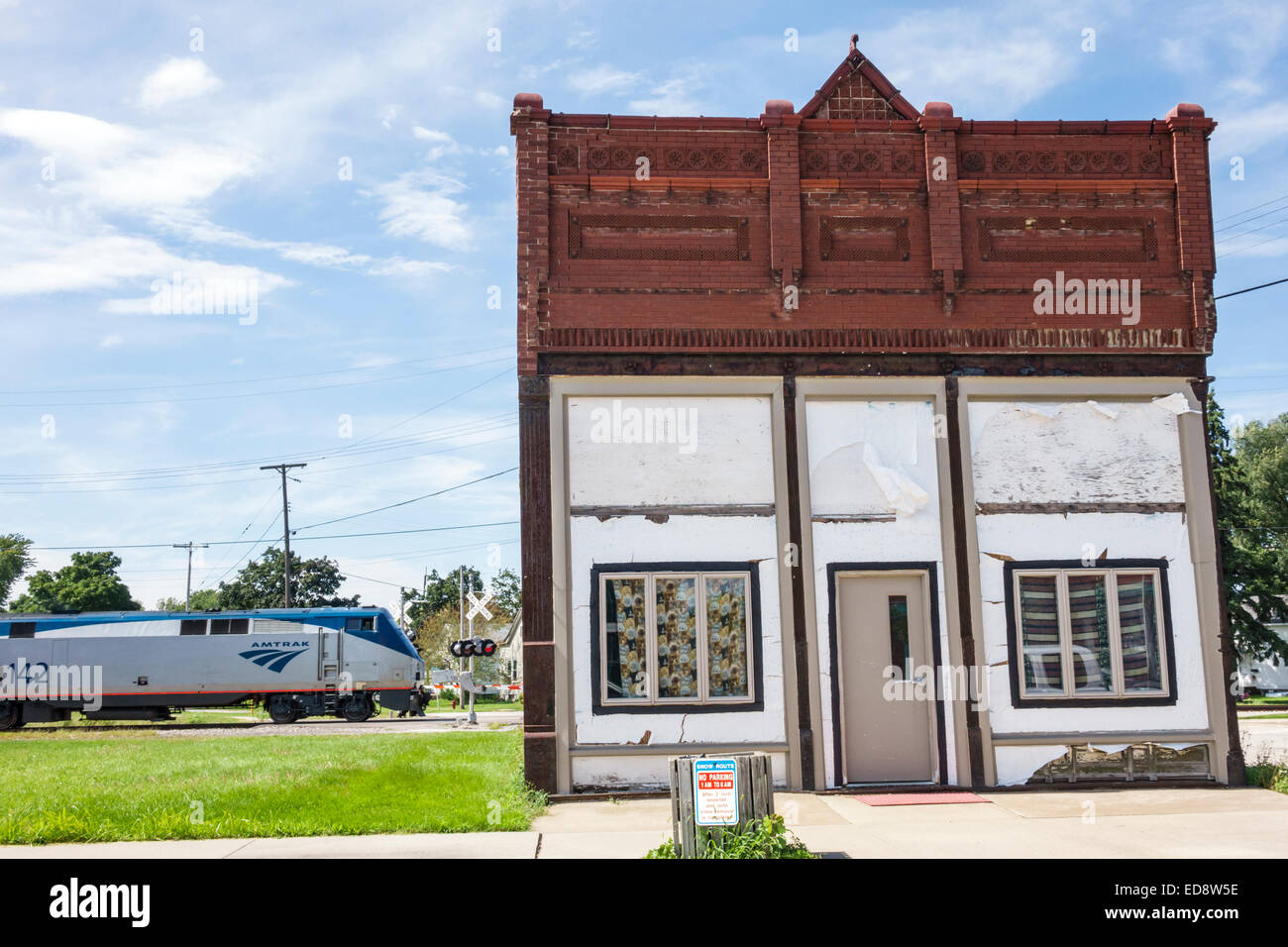 Illinois Chenoa,historic highway Route 66,US 66,highway,building,exterior,red brick,train,Amtrak,railroad,IL140909019 Stock Photo