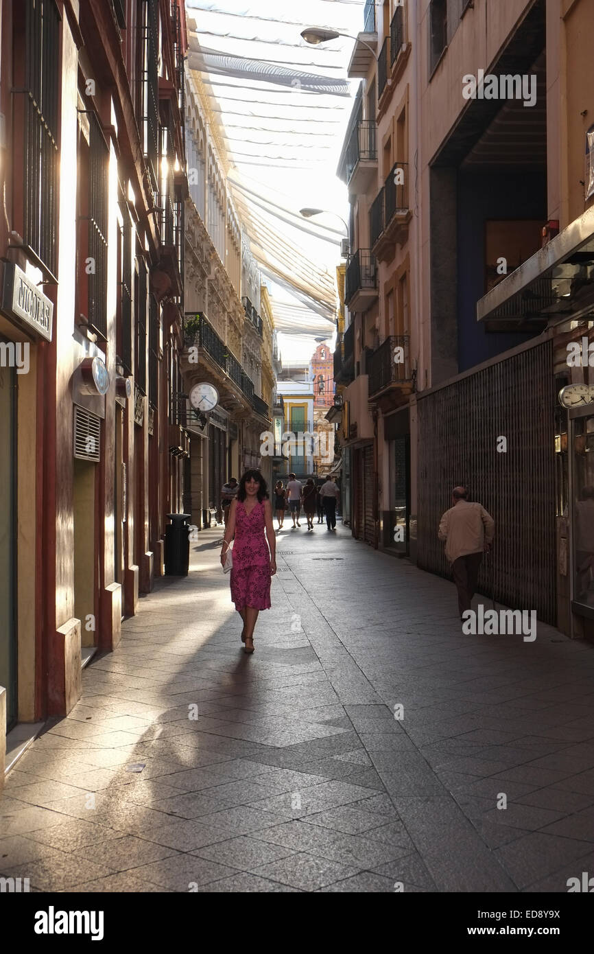 Seville Spain: Covers provide shade in this Seville Shopping Street Stock Photo