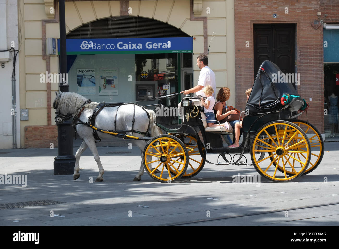 Seville Spain - Seeing the sights in a traditional horse and carriage Stock Photo