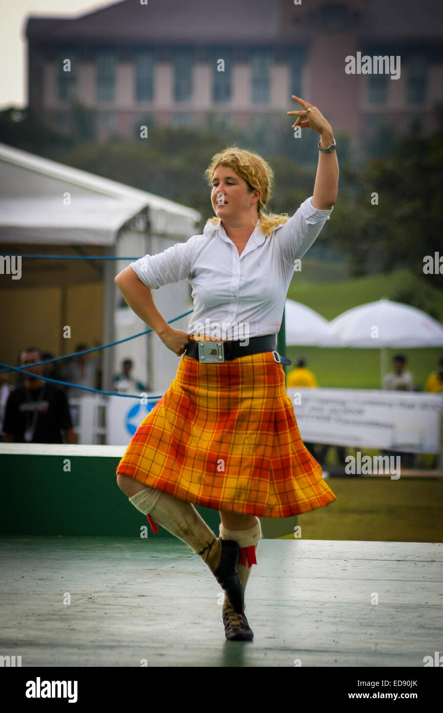 Woman performs Scottish dance during the 2005 Jakarta Highland Gathering. Stock Photo