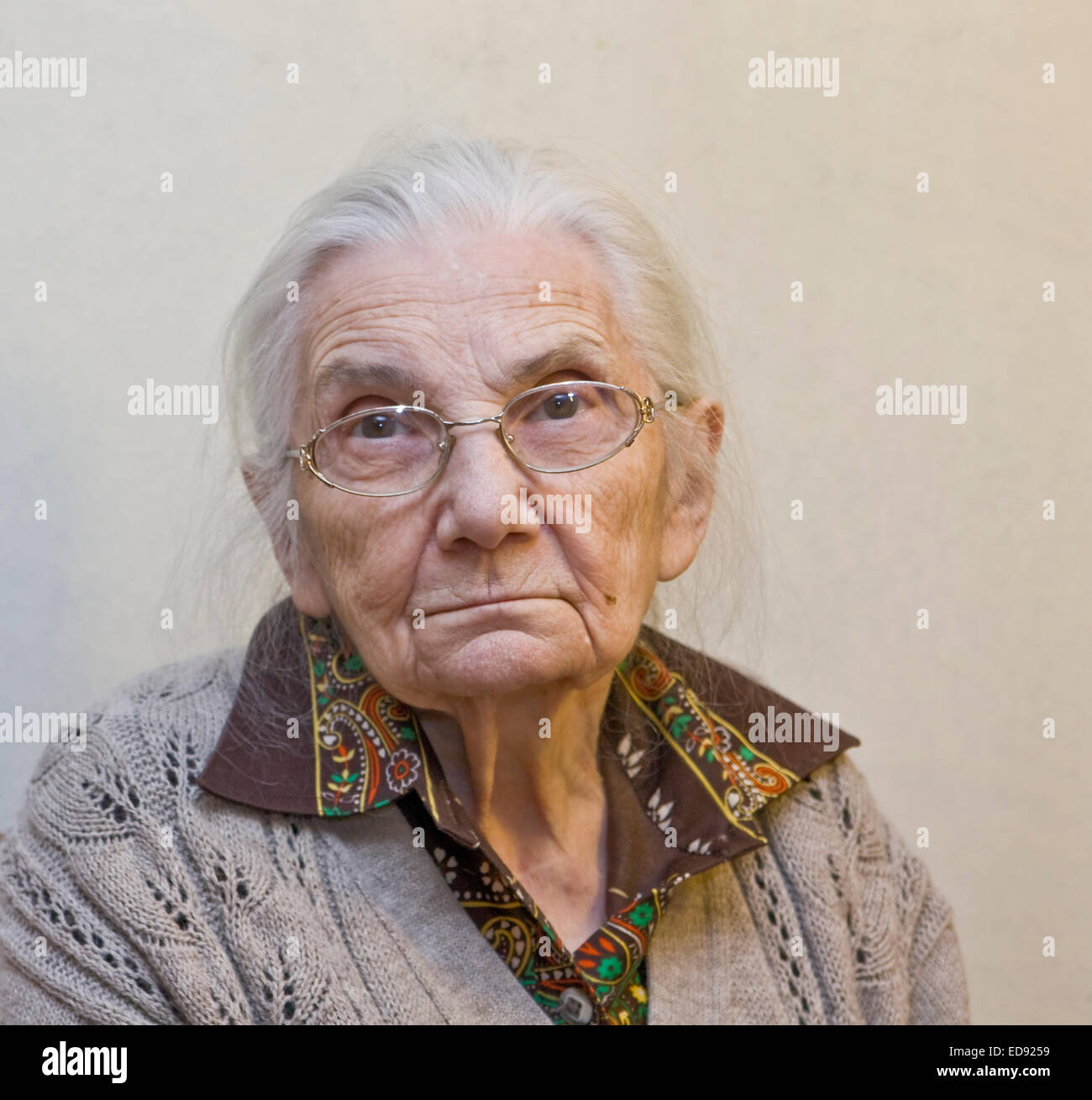 Portrait Of Old Lady In Glasses With White Hair European Stock