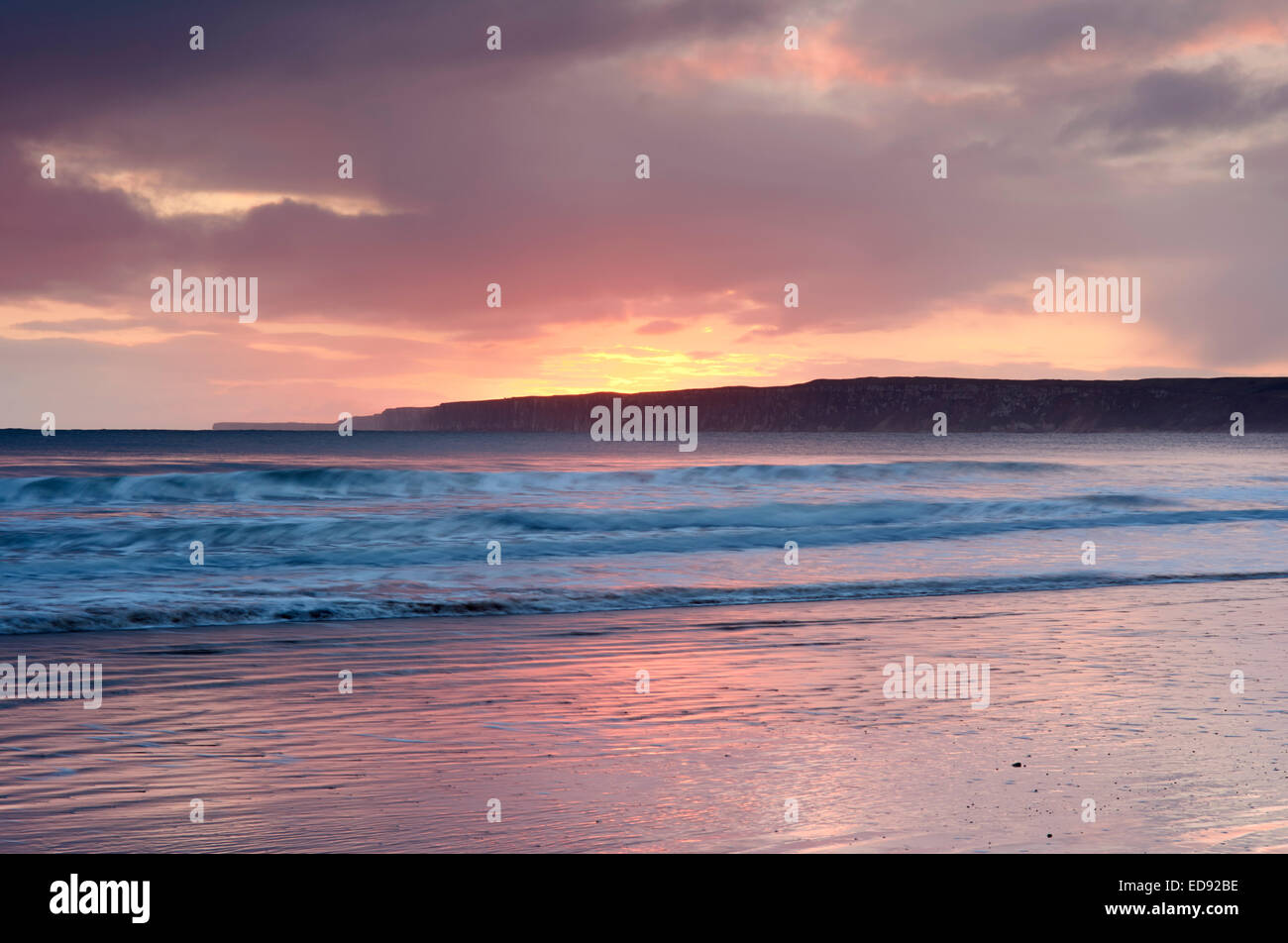 Sunrise on the beach at Filey Bay Yorkshire, England, UK Stock Photo