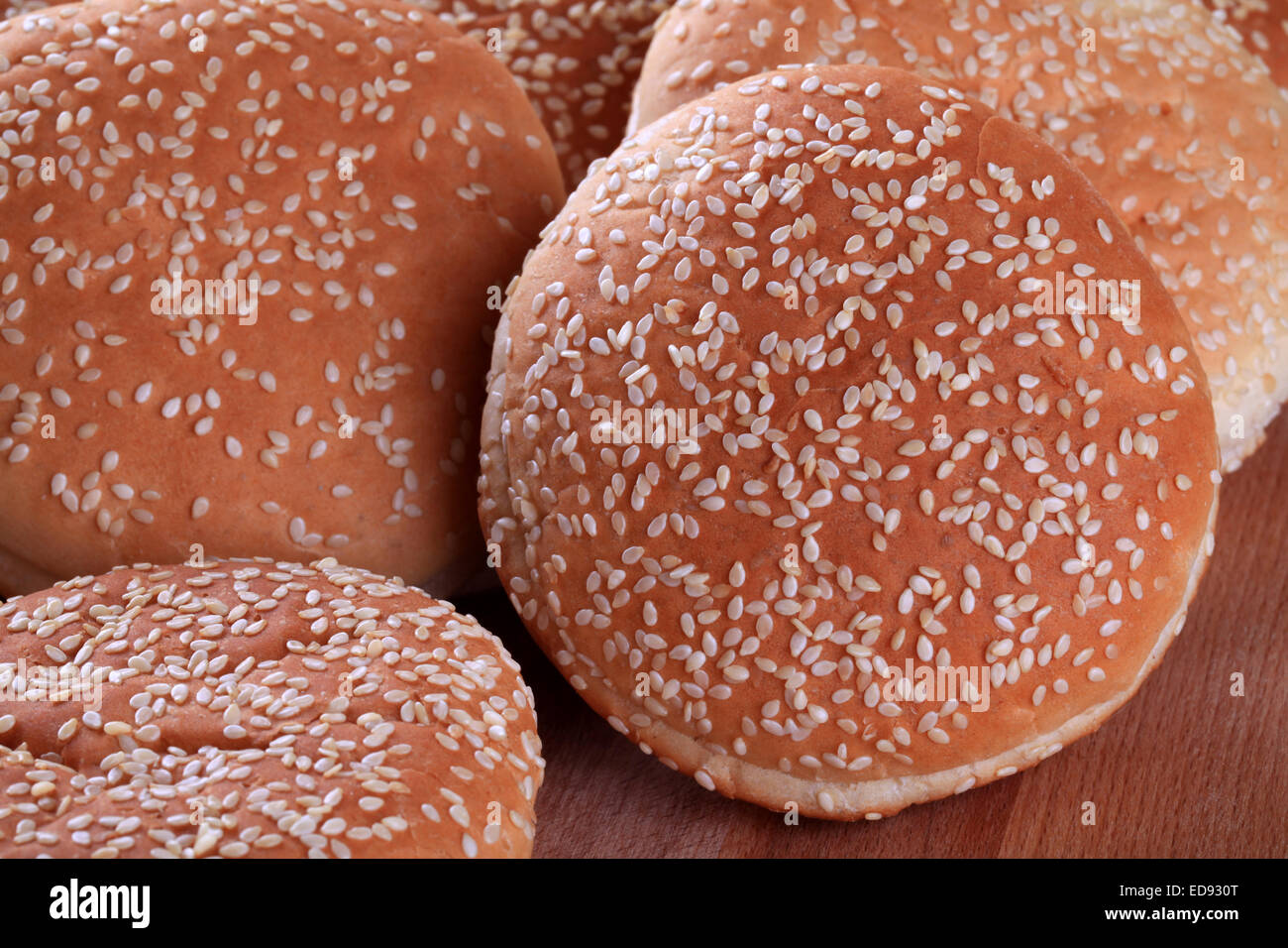 Hamburger buns with sesame seeds on top Stock Photo Alamy