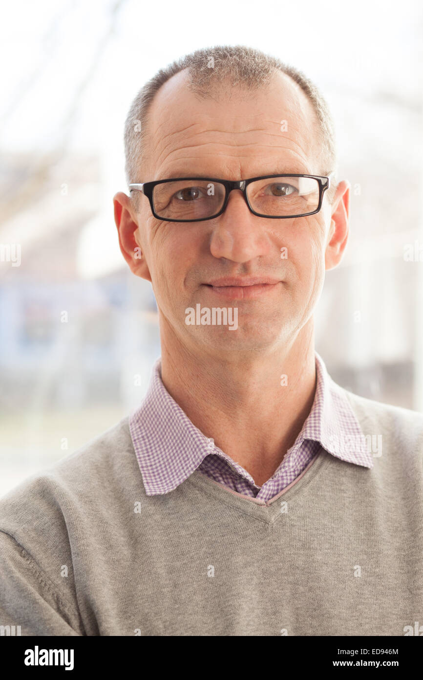 Closeup portrait of casual style adult man in glasses Stock Photo