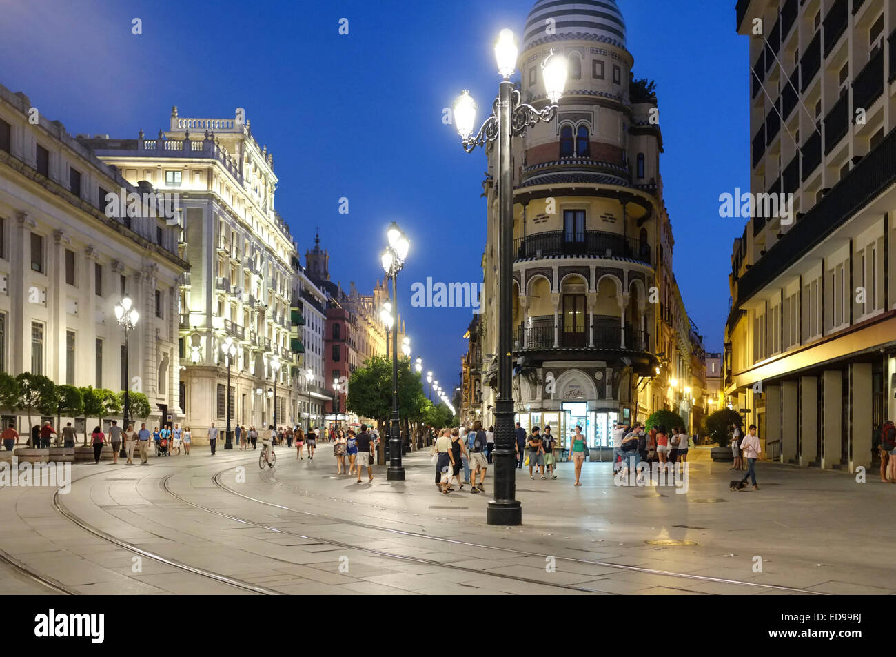 Seville Spain: People out on the street at night in Sevilla Stock Photo
