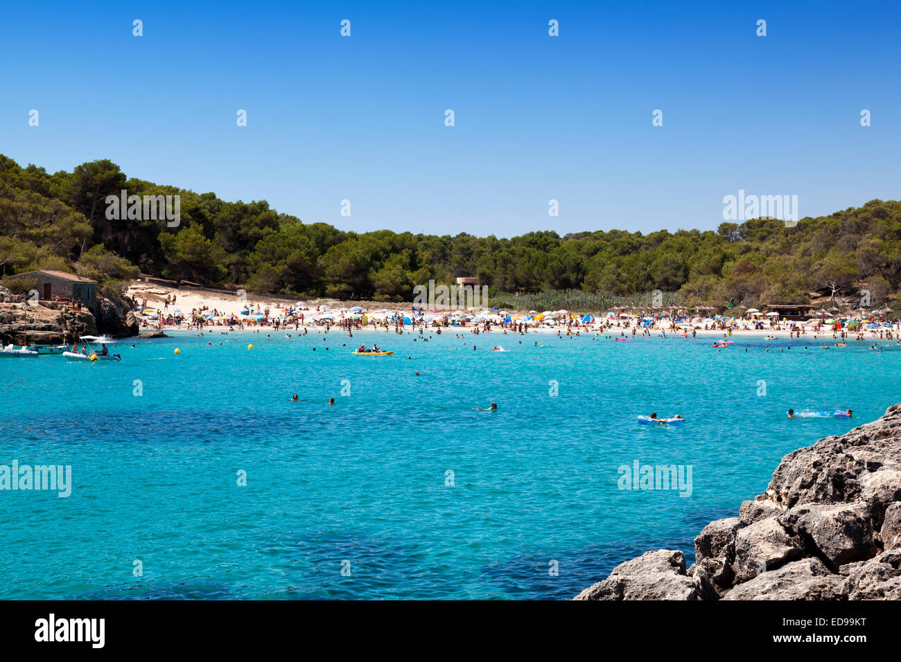 Cove in Majorca plenty of swimmers Stock Photo