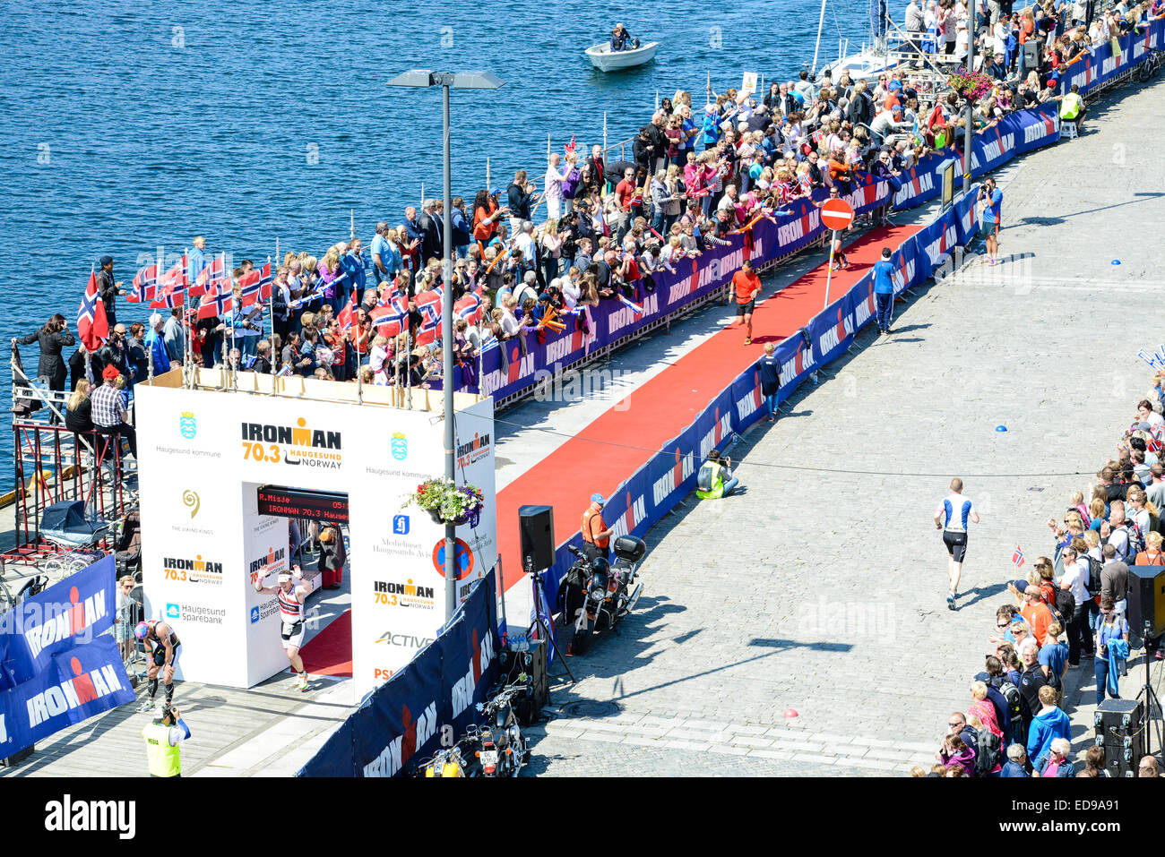 Crowds flock to the finish line for Ironman 70.3 Norway in Haugesund. Stock Photo