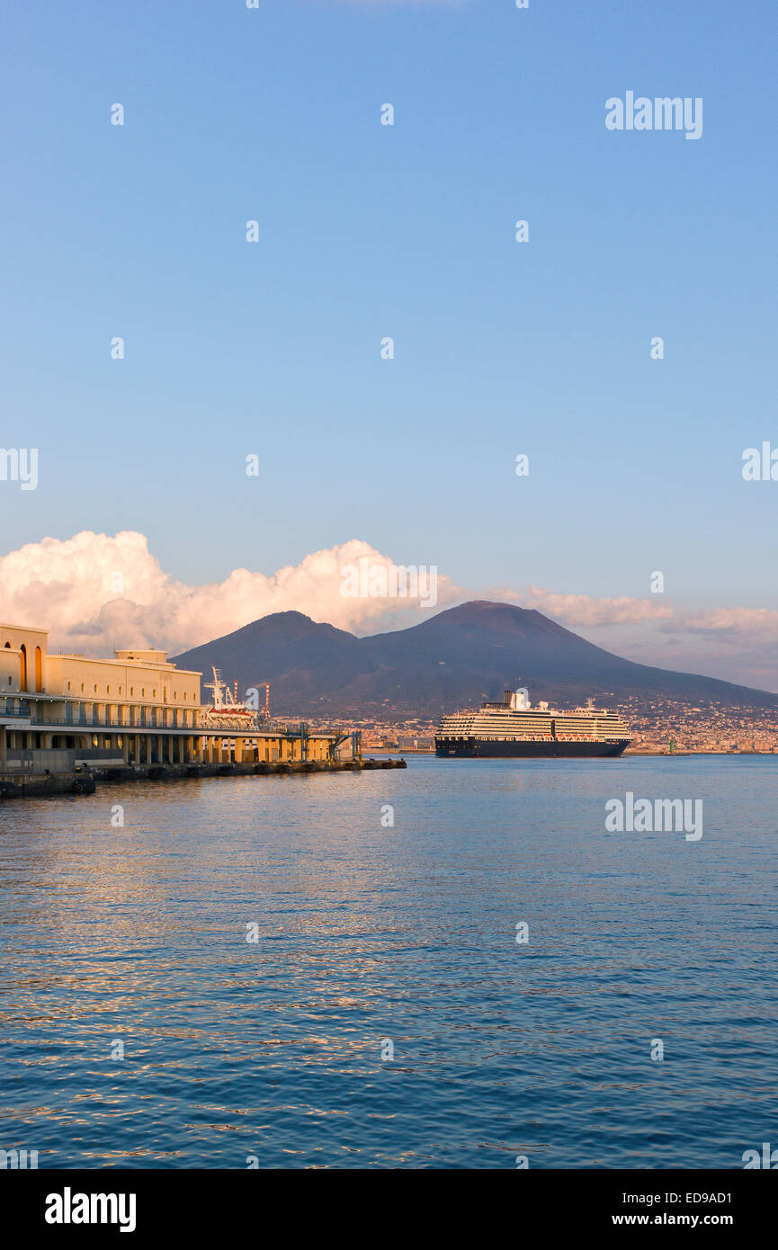Cruise ship 'MS Noordam' departing the port at Naples with Mount Vesuvius behind. Naples, Campania, Italy Stock Photo