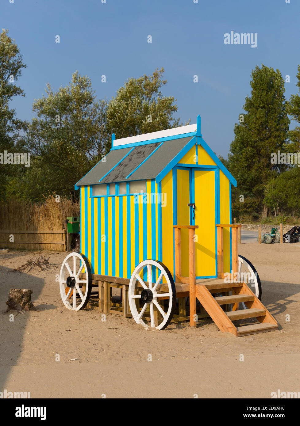 Seaside changing room bath car hut with wooden wheels in yellow and