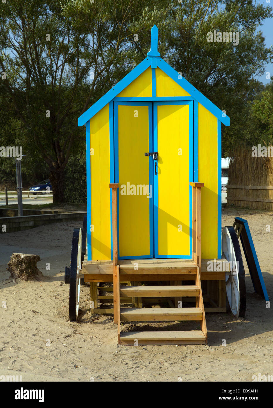 Seaside changing room bath car hut with wooden wheels in yellow and