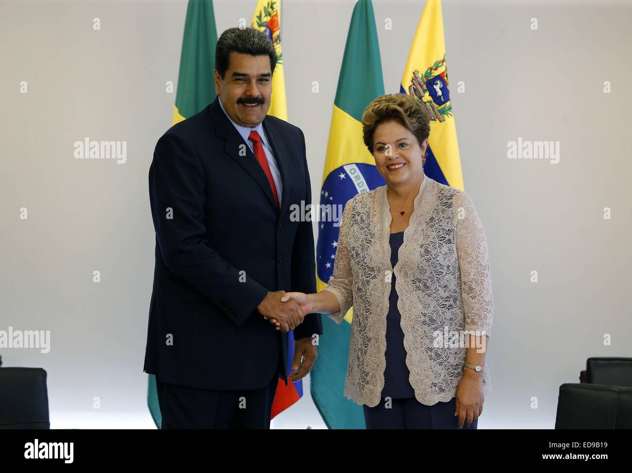(150103) -- BRASILIA, Jan. 3, 2015 (Xinhua) -- Brazilian President Dilma Rousseff (R) meets with Venezuelan President Nicolas Maduro at the Planalto Palace in Brasilia, capital of Brazil, on Jan. 2, 2015, a day after being sworn in for her second persidential term. (Xinhua/Dida Sampaio/AGENCIA ESTADO) (jg) (lmm) ***BRAZIL  OUT*** Stock Photo