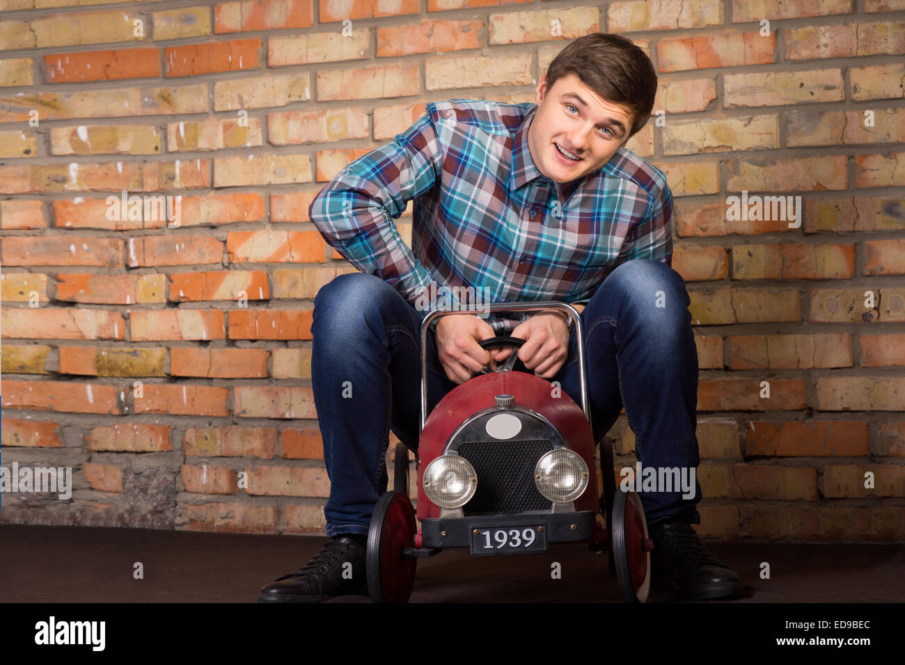 Man Small Car Funny High Resolution Stock Photography And Images Alamy Man Small Car Funny High Resolution Stock Photography And Images Alamy