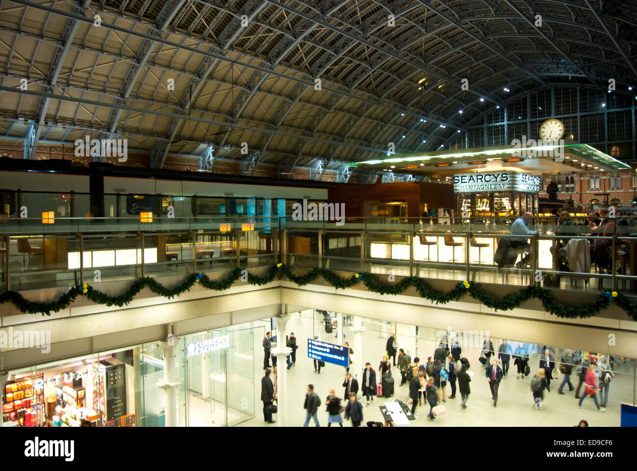 Upper level of St Pancras International railway station looking towards the Champagne Bar and overlooking lower level Departures Stock Photo