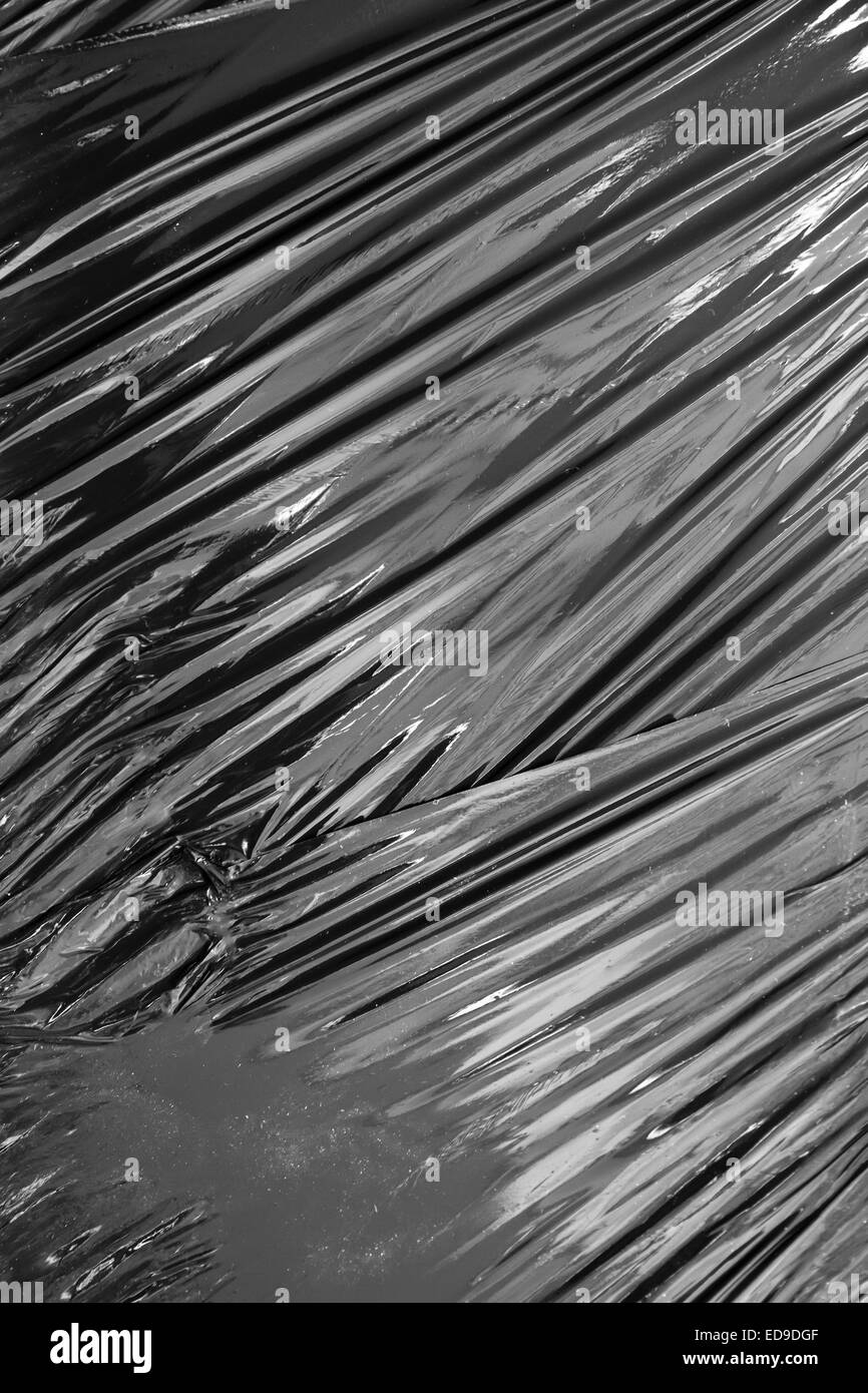 Abstract background photo texture. Black polyethylene packing film Stock Photo