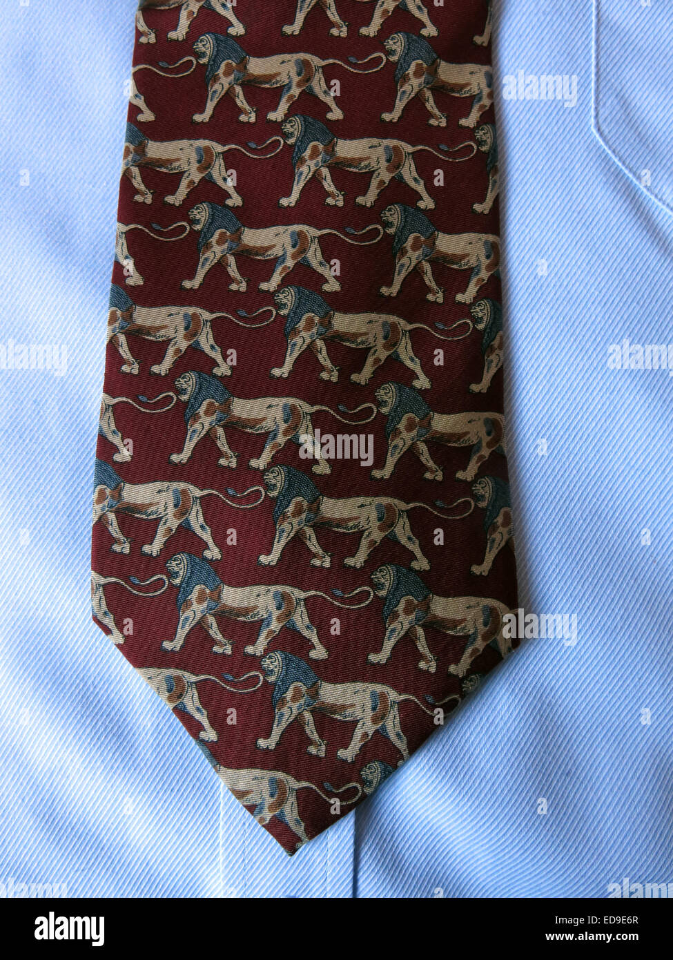Interesting vintage maroon brown lion tie, male neckware in silk Stock Photo