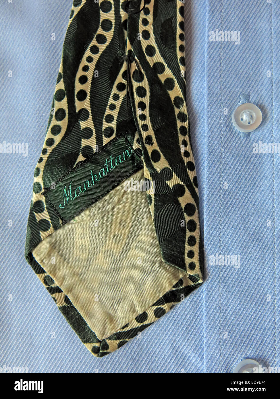 Interesting vintage green Manhatten tie, male neckware in silk Stock Photo