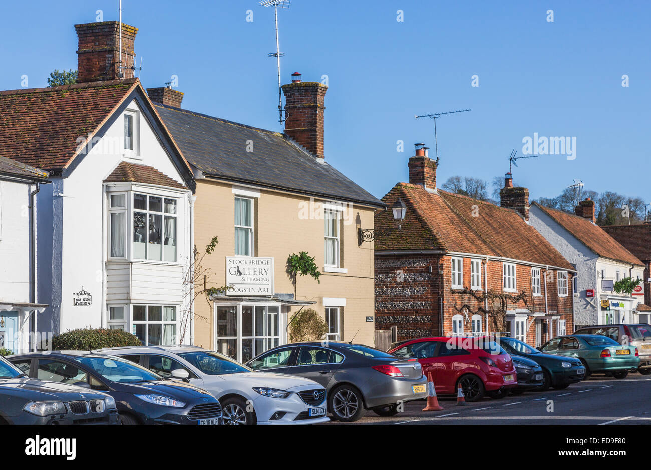 Typical UK heritage real estate property; view of cottages, shops and