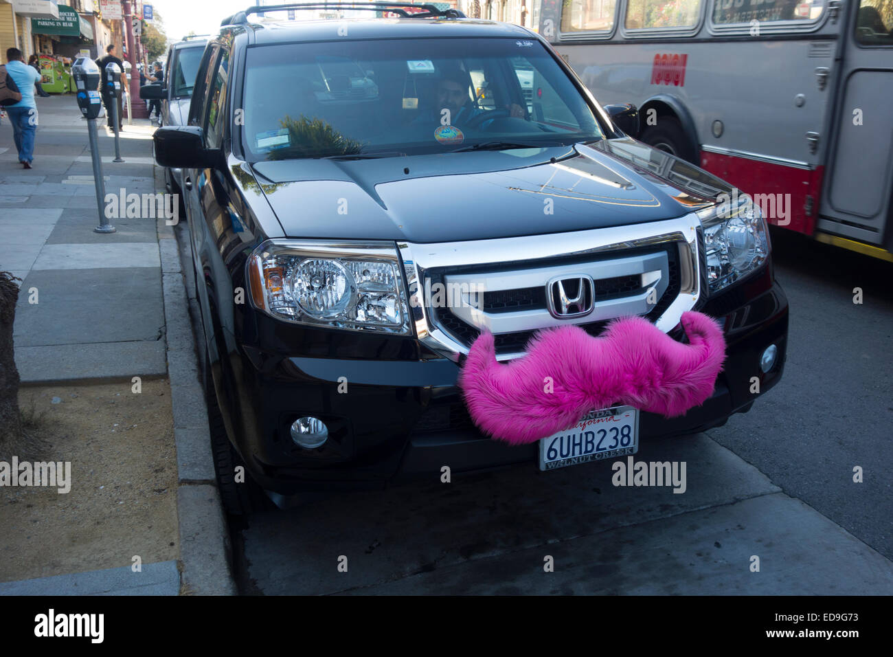 Lyft pink moustache car in San Francisco CA Stock Photo
